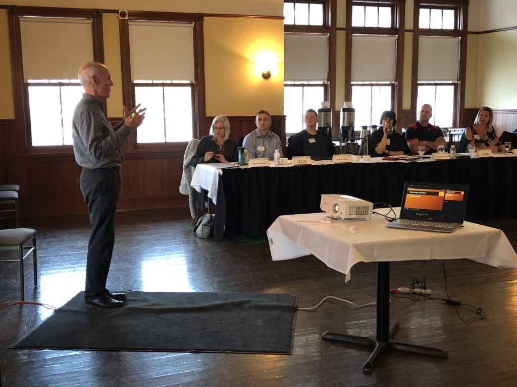 Dr. Michael Breen presenting to a seminar room